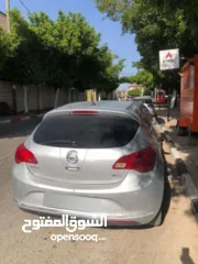  2 استرا ترخيص 2013 سيارة بحالة ممتازة مع وجود عيوب بسيطة في البودي جير عادي ماتور راكب جديد مستورد