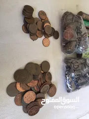  14 عملات معدنية مختلفة من دول مختلفة عربية و عالمية