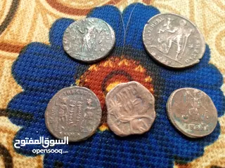 4 خمس  عملات معدنية روماني قديمة جدا     تذكارية  للبيع بسعر مغري 50 دينار فقط   ...............