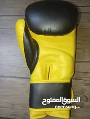  9 كفوف ملاكمه وواقيات رجلين ماركه 2 TUF أقوى واحسن ماركه بالتصنيع....وباندج venom غير مستعملين....