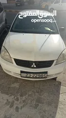  1 ميتسوبيشي لانسر للبيع بحاله ممتازه