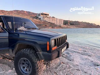  14 للبيع - جيب شيروكي XJ موديل 1999  جاهز للبر والمغامرات!