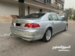  6 Bmw 750Li  باخرة جديدة جداً 86 ماشية كفالة عامة