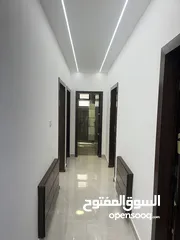  12 شقه طابق اول في احلى مناطق ضاحية الرشيد قرب دوار اقرا تشطيبات سوبر ديلوكس