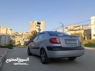  5 كيا برايد 2009 اتماتك دهان شركه ولا غرام بويا بسعر حرق 32000 ألف نقدا بدل وارد منبدل