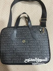  1 شنته لابتوب والاوراق جديده