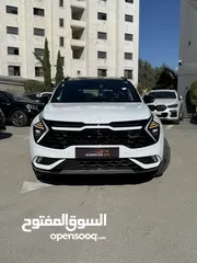  2 كيا سبورتاج GT Line ترخيص 2022 محرك 1600 هايبرد plug in/يقطع على الشحنه 65 كيلو متر  271 حصان