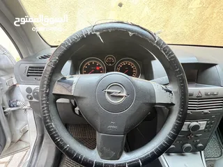  12 اوبل استرا 2005