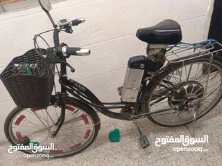  12 بيع بسكليت ياباني محوله كهربائيه متور 1500 بطارية 48 فولت استعمال بسيط جدا اخت الجديدة