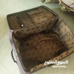  9 شنتة سفر جر لون بنفسجي غامق حجم كبير