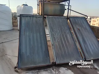  2 ألواح شمسية مع برميل