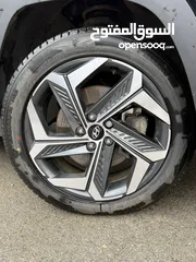  5 هونداي توسان ترخيص 2022 محرك 1600 هايبرد plug in/يقطع على الشحنه 65 كيلو متر  جير أوتوماتيك