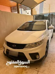  6 كيا فورتي فحص 3 جيد امام يمين مضروب ومشغول
