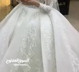  9 فستان عرس مستعمل للبيع لضرورة القسوة ابيض نفاش مع شاحط بسطل للامانه متل سندريلا
