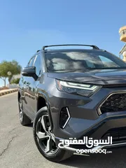  2 تويوتا راف فور //2022// هايبرد Plug_in Prime فحص كامل 7جيييد بسعررررر مغررررري حره عداد قليل Rav4