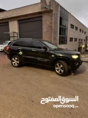 2 جيب جراند شيروكي اوفر لاند  موديل 2014 للبيع او البدل امكانية التقسيط