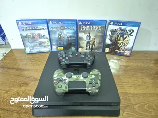  2 PS4 Slim 1 TB with 2 dualshock 4 controllers and 4 games