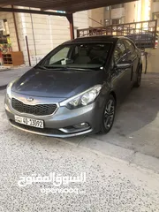  4 للبيع كيا سيراتو 1600Cc وكاله الكويت 2016 رمادي الداخل بيج فل اتوماتيك