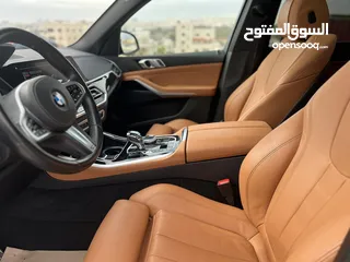  9 بي ام دبليو X5 لون اسود موديل 2022 Mكيت فل كامل فحص كامل وارد وكاله عمان