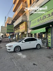  2 لانسر فراشه ex 2014  خصوصي اصلي بحال الشركه مالك ثاني