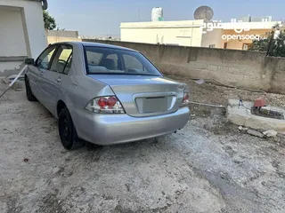  1 لانسر موديل 2004 ماتور 1600 فحص مرفق