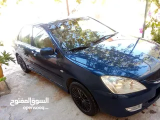  2 لانسر2006محرك 1600اصلي