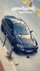  3 BMW 330i بالكرتونة