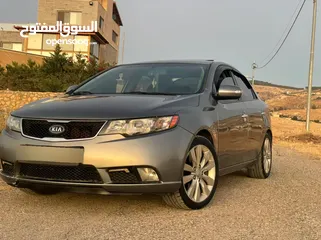  2 KIA forty  2010 Full options