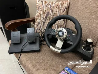  4 PlayStation 4 slim للبيع مستعمل لمدة 3 سنوات مع سيديين ويد مستعملة مع دركسون ودعسة نوع ASA speed