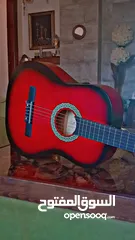  4 جيتار nailon احمر بحالة ممتازه، استعمال بسيط جدا