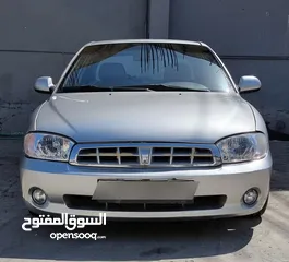  1 كيا سبيكترا 2001 بسعر 2400 جير عادي سياره نظيفه جدا  kia spectra 2001