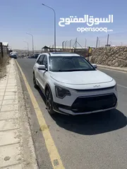  2 كيا نيرو 2023 تصلح للإعفاءات تورنج فل كامل