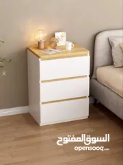  6 خزانة بيضاء جانبية أنيقة بلمسة خشبية عصرية  الاناقة والبساطة في تصميم واحد  ادراج عملية لحفظ اغراضك