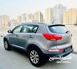 4 A Very Well Maintained KIA SPORTAGE 2015 GREY GCC In Mint Condition