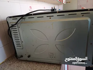  4 للبيع فرن كهرباء ايموجي تووب نظافه شغال 100%