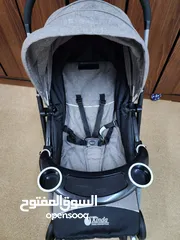 Reversable baby stroller full safety belt .