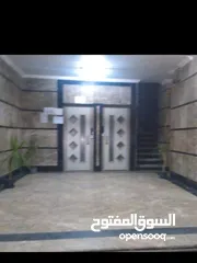  2 شقة طوب احمرعروبة مريوطية  في برج شهير وفخم علي العروبة الرئيسى البرج أمام قهوة المحروسة