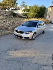  5 دفعه كيا فورتي 2009 ماتور1600 بنزين جير اوتماتيك حساسات خلفي مكيف شغال شبابيك كهر