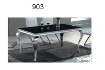  1 Brand New Black Glass Top Dining Table for Sale .
