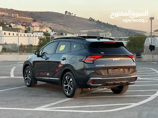  10 كايا سبورتاج  2022 فل الفل فتحة سقف  2x4 ///240Hp بنزين + كهرباء  ( Haybrid) 1600cc