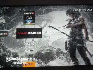  1 PS3 Slim (بلاستيشن 3 سليم) مُهكَّر 150GB + يد أصلية + 11 لعبة