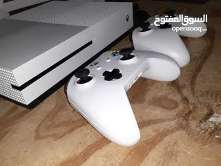  2 Xbox One S with two controllers