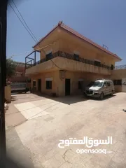  6 منزل للبيع على شارع 100 مطل منطقة جميلة جدا و هاذيه