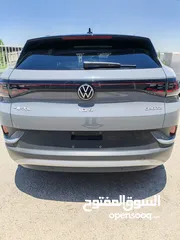  5 VOLKSWAGEN ID.4 CROZZ PRO   مع فتحه بانورما متحركة عداد 9k فقط