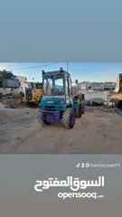  8 تعهدات عامة وهدم مباني ونقل جميع أنواع مواد البناء ونقل تراب أحمر وتعبيد الشوارع بأفضل أنواع الخلطة