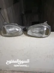  2 اضويه اماميه اوبل كورسا عدد 2 صناعه المانيه