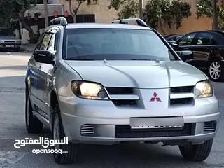  22 ميتسوبيشي آوتلاندر اوتوماتيك 2003 توب نظافة بسعرررر مميززز محرك 2400cc