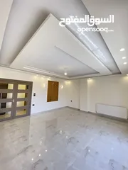  4 شقة طابق اخير مع روف 230 متر وتراس 100 متر على شارعين  طريق المطار خلف المدارس العالمية بسعر مميز