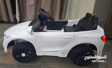  5 Excellent condition like new Baby Kid electric car with remote