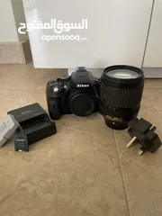  1 Nikon d5300 with 18-140mm lenses without lense cover like new نيكون d5300 مع عدسة 18-140مم شبه جديدة